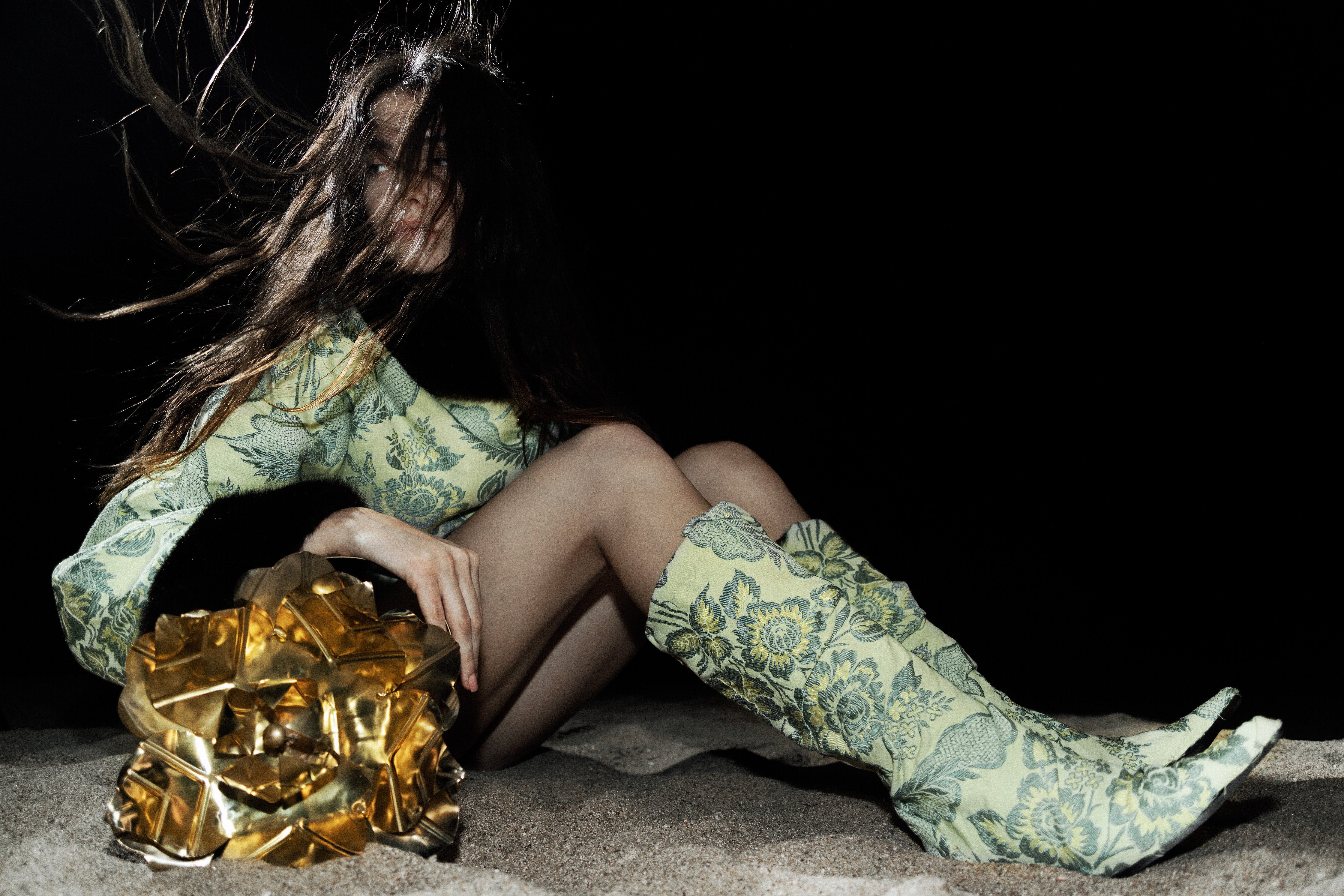 A bag made using scrap brass metal pieces by behen studios sold by two extra lives