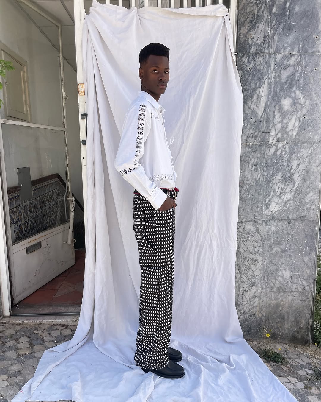 Campino shirt from Béhen Studios with an asymmetric front opening and tassels to tie, offers a distinctive twist on the classic design. sold by two extra lives