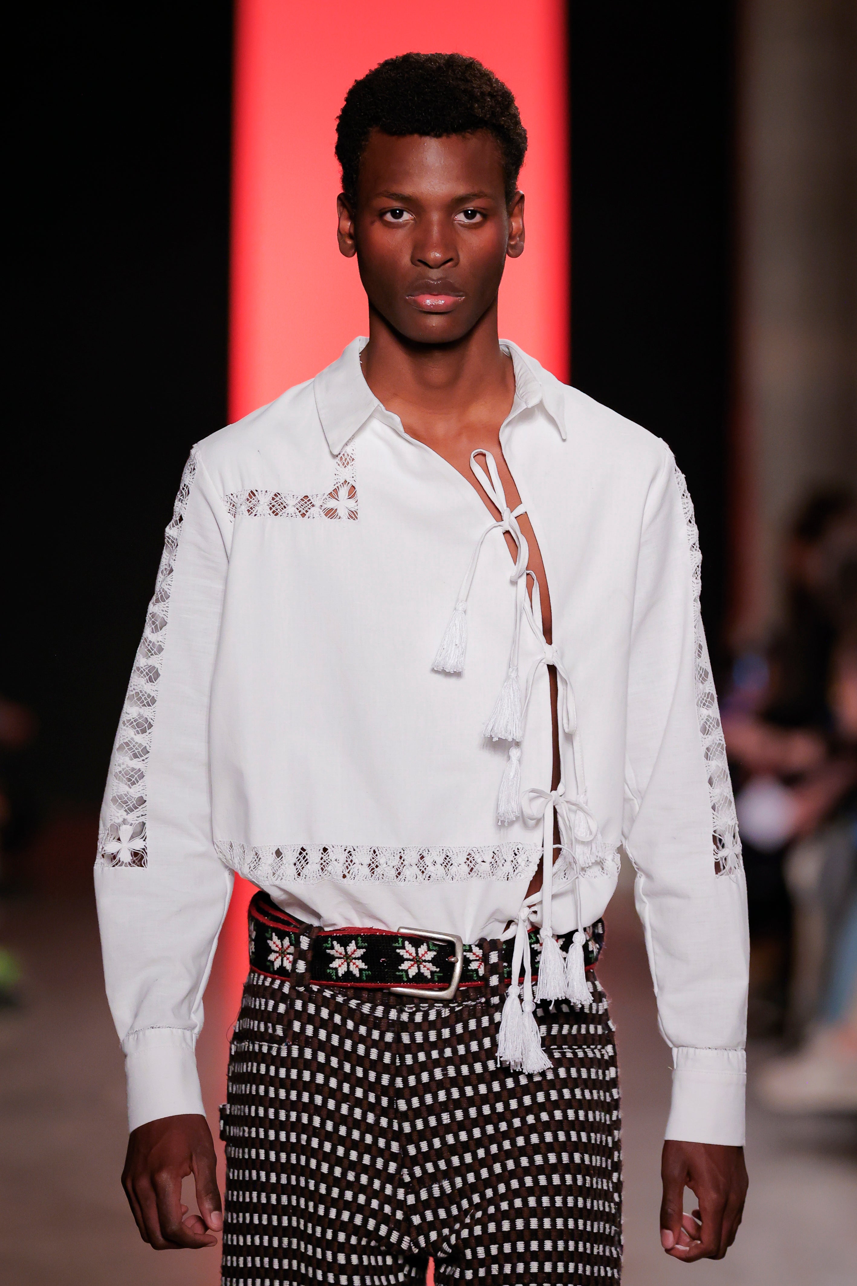 Campino shirt from Béhen Studios with an asymmetric front opening and tassels to tie, offers a distinctive twist on the classic design. sold by two extra lives