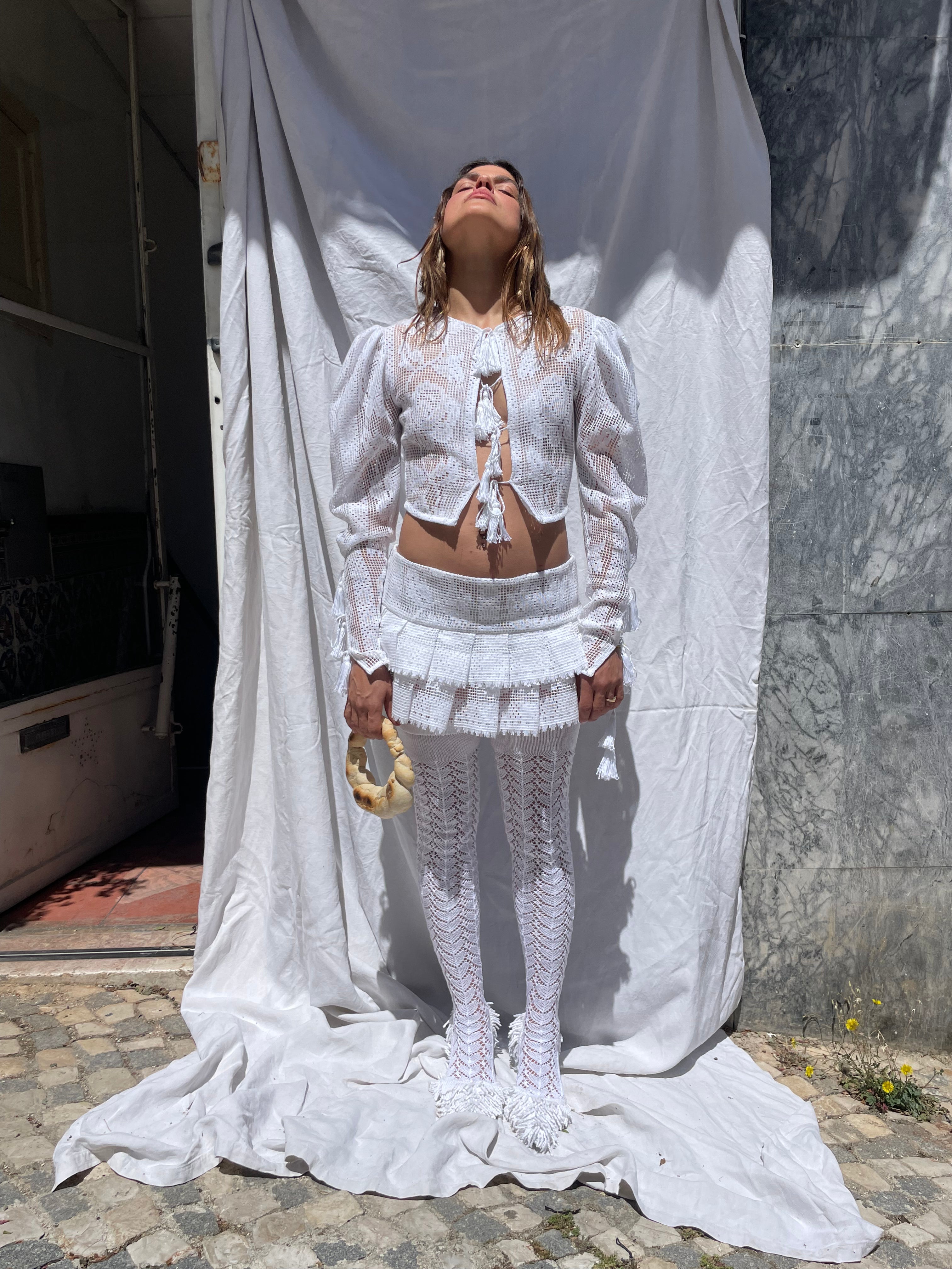 White frilled skirt made using table cloth by a brand called behen sold by two extra lives