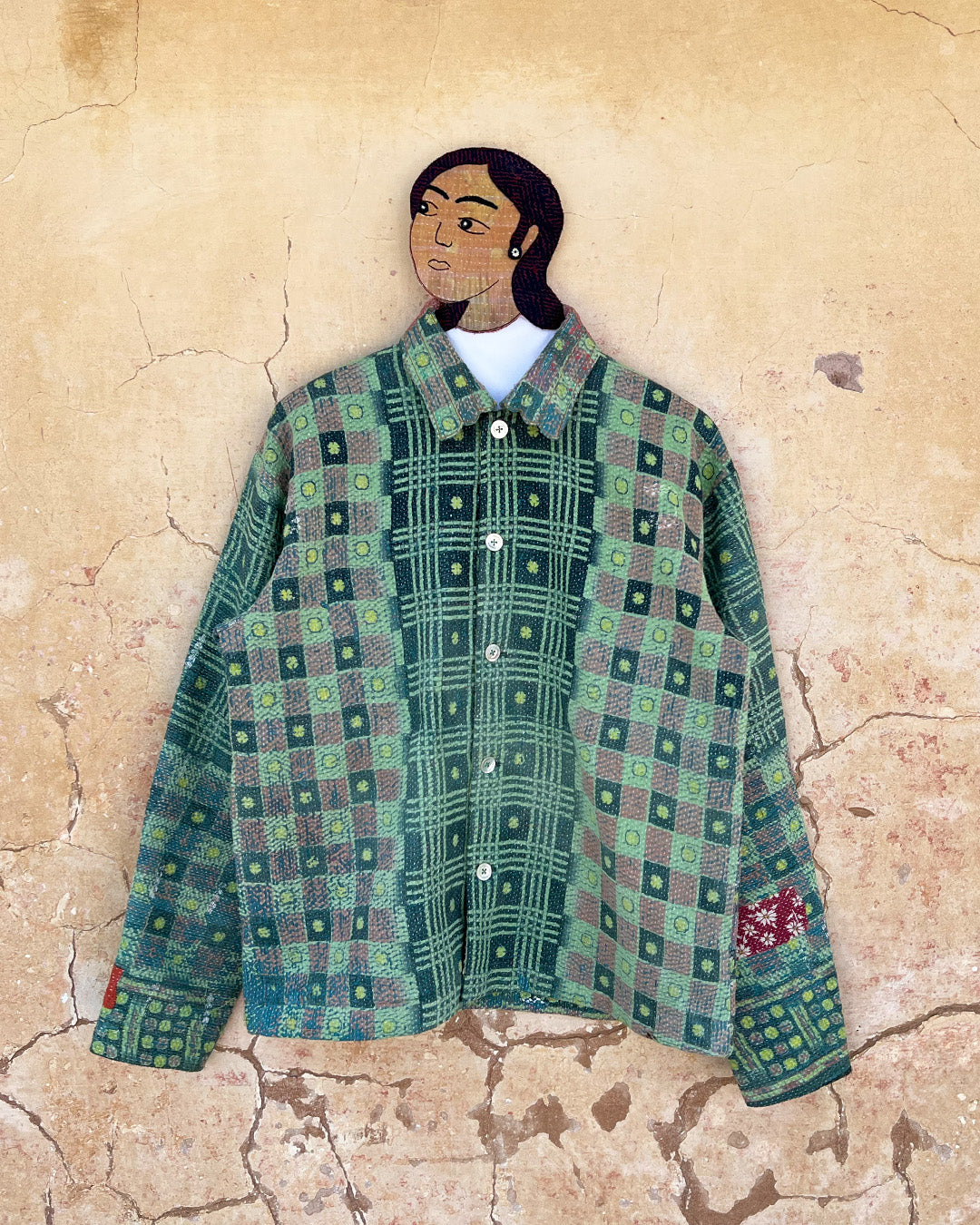 Green patterned shirt on a textured beige background DAY-AND-AGE-YAKSHI-JACKET-TWO-EXTRA-LIVES