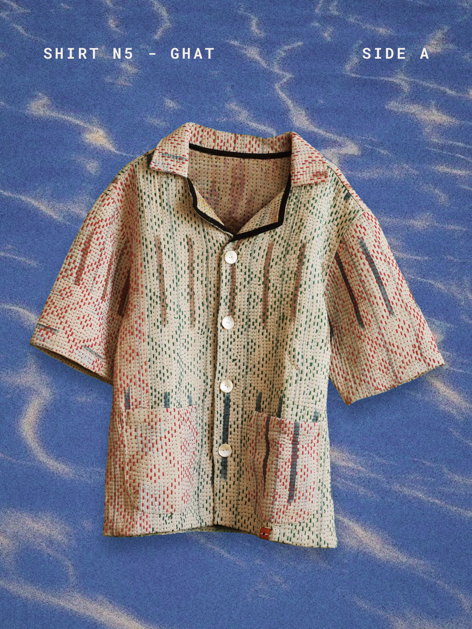 Patterned shirt on a blue background with text indicating 'Shirt N5 - Ghat'.