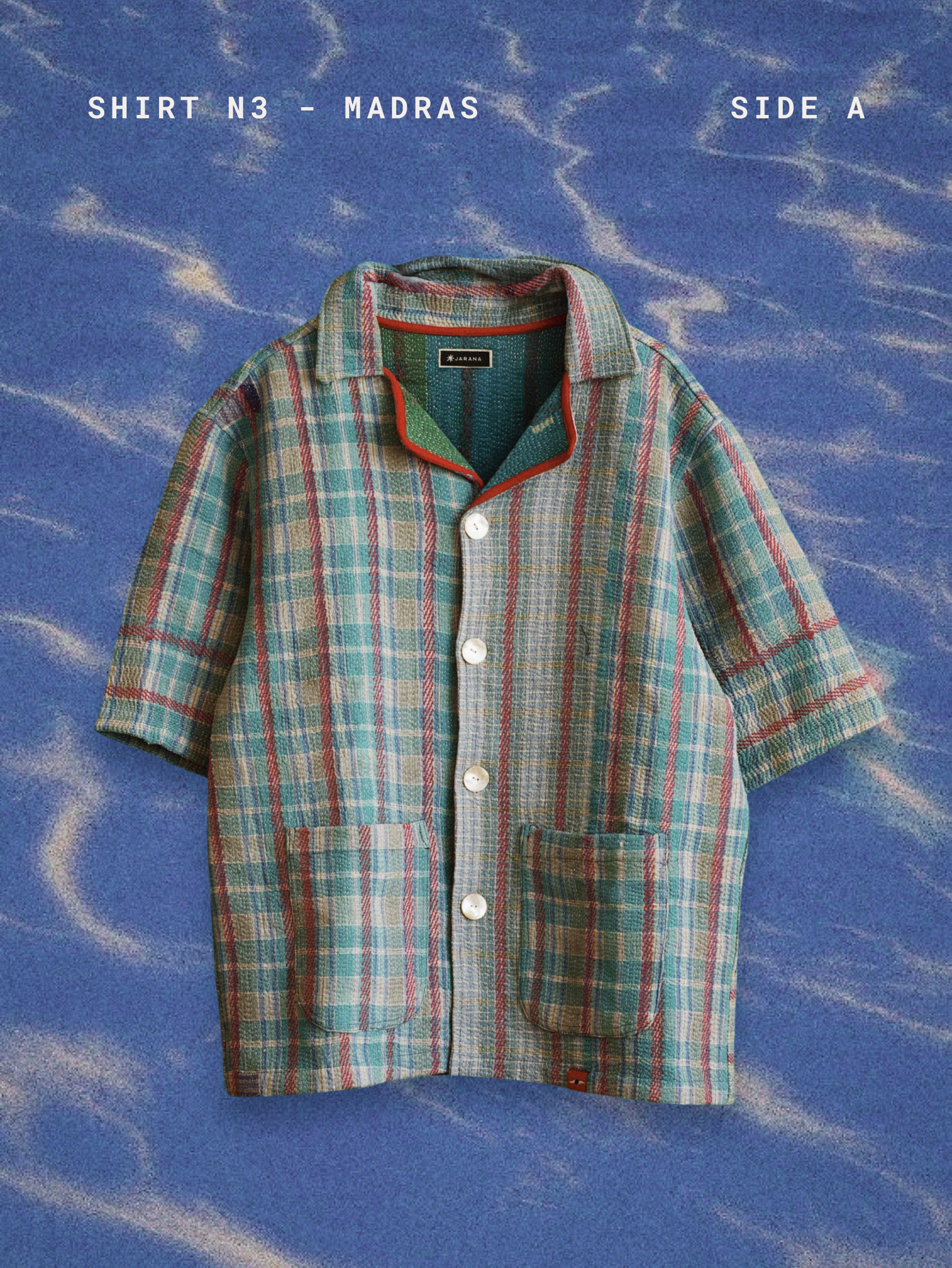 Plaid shirt on a blue textured background with 'Shirt N3 - Madras' text.